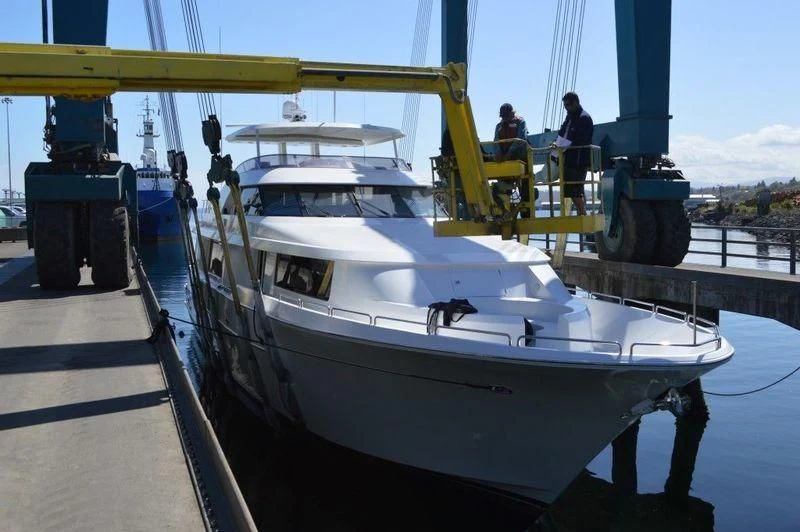 a boat docked at a pier aboard LEGEND Yacht for Sale