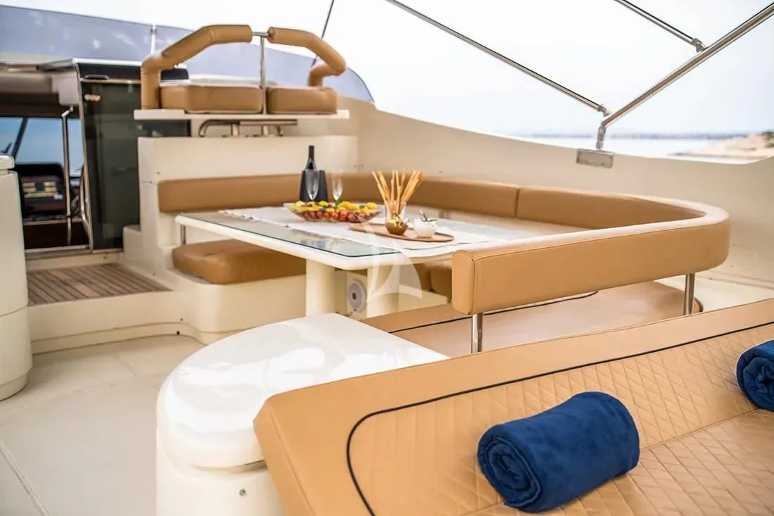 a room with a couch and a table aboard BELLAS BOY Yacht for Sale