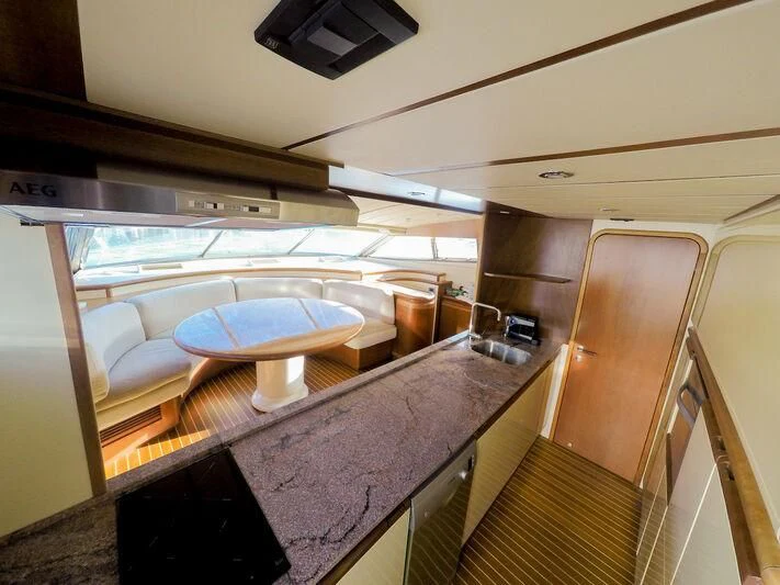 a kitchen with a large island aboard BELLAS BOY Yacht for Sale