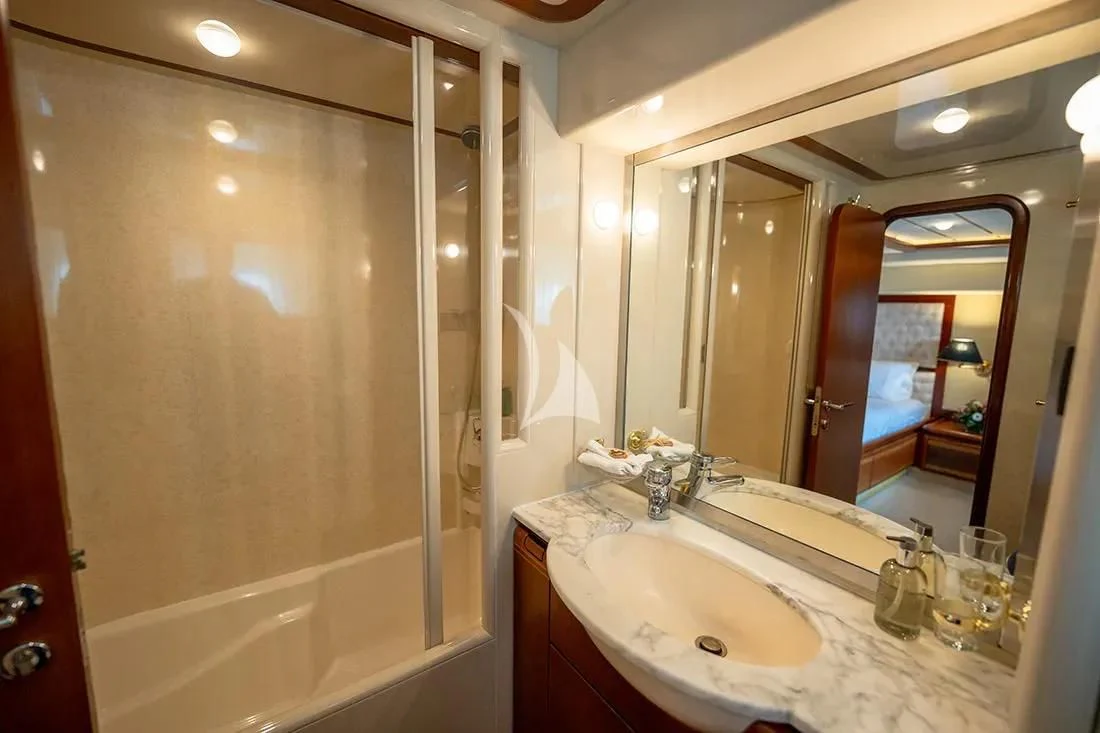 a bathroom with a large mirror aboard BELLAS BOY Yacht for Sale