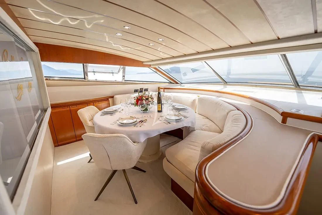 a table in a train aboard BELLAS BOY Yacht for Sale