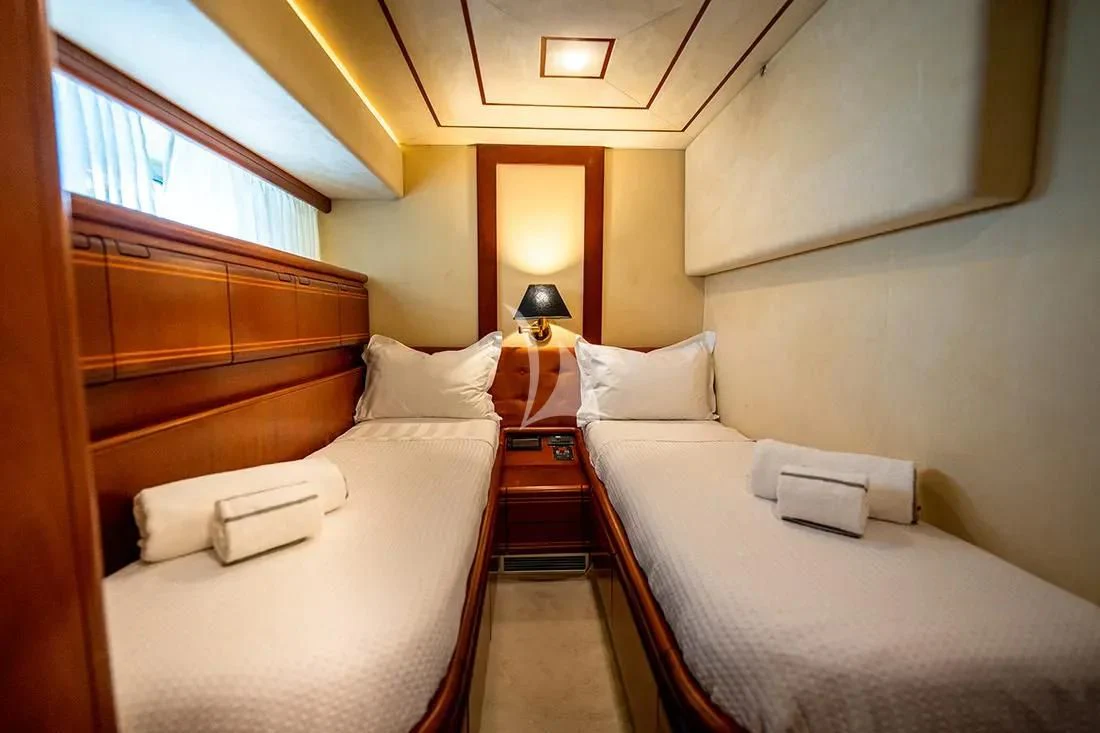 a room with two beds aboard BELLAS BOY Yacht for Sale