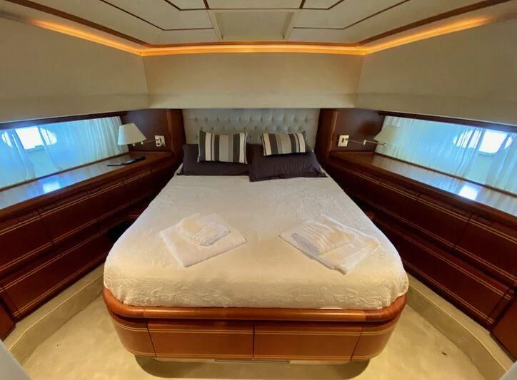 a bed in a room aboard BELLAS BOY Yacht for Sale