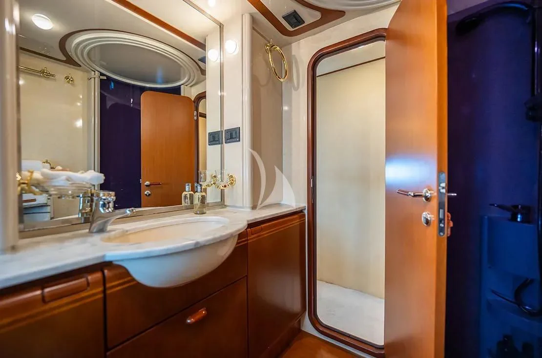 a bathroom with a large mirror aboard BELLAS BOY Yacht for Sale