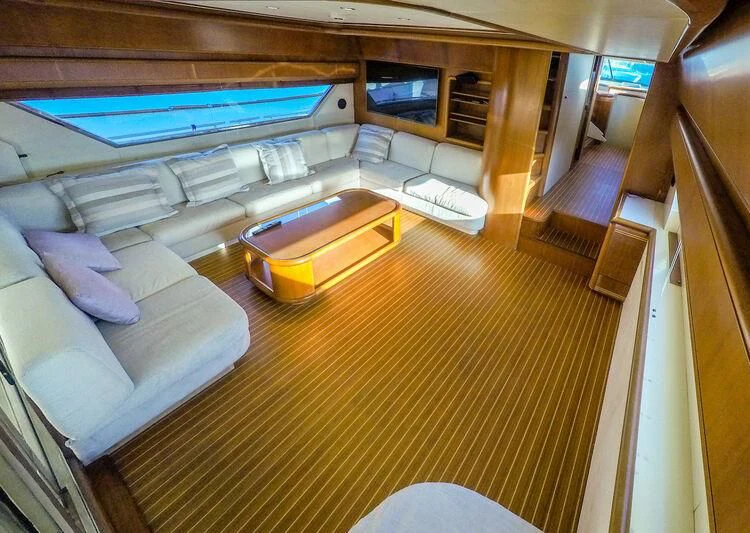 a room with a bed and a couch aboard BELLAS BOY Yacht for Sale