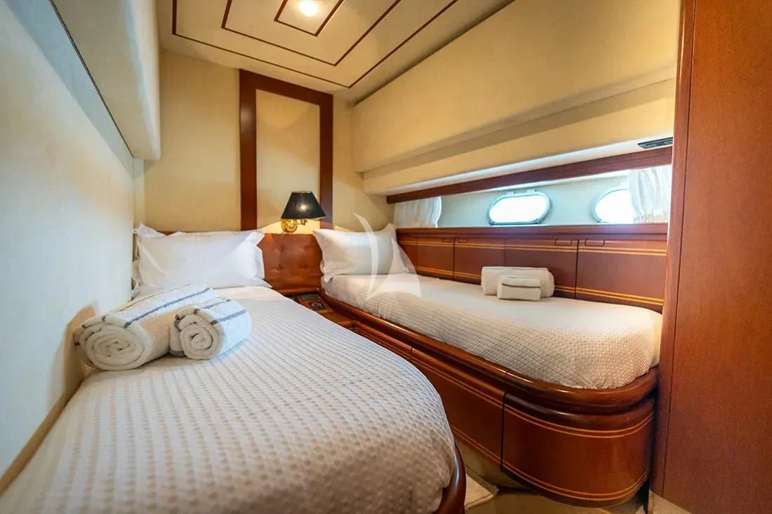 a couple of beds in a room aboard BELLAS BOY Yacht for Sale