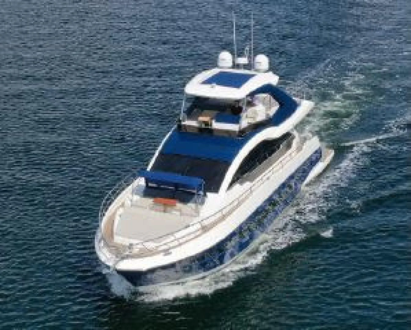 a boat on the water aboard THE ONLY BLUE 66 FLY Yacht for Sale