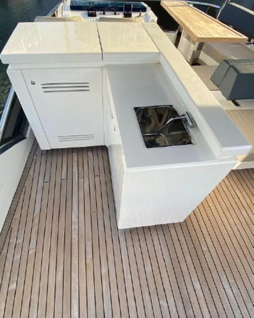 a cat in a box aboard THE ONLY BLUE 66 FLY Yacht for Sale
