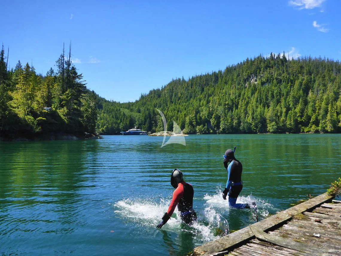 a couple of people in the water aboard ASCENTE Yacht for Charter