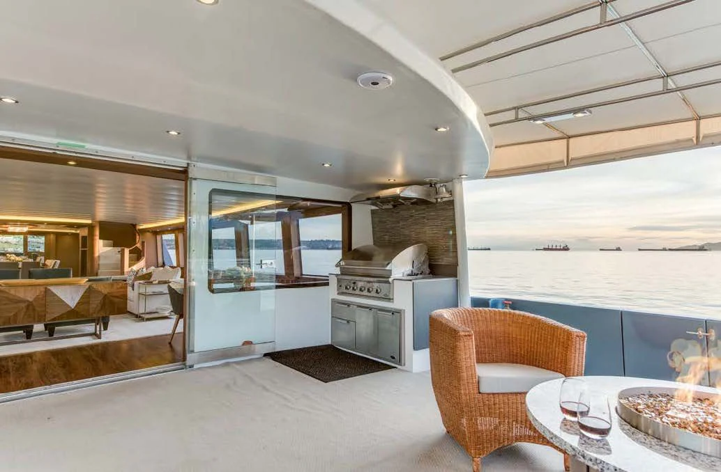 a kitchen with a large glass door aboard ASCENTE Yacht for Charter