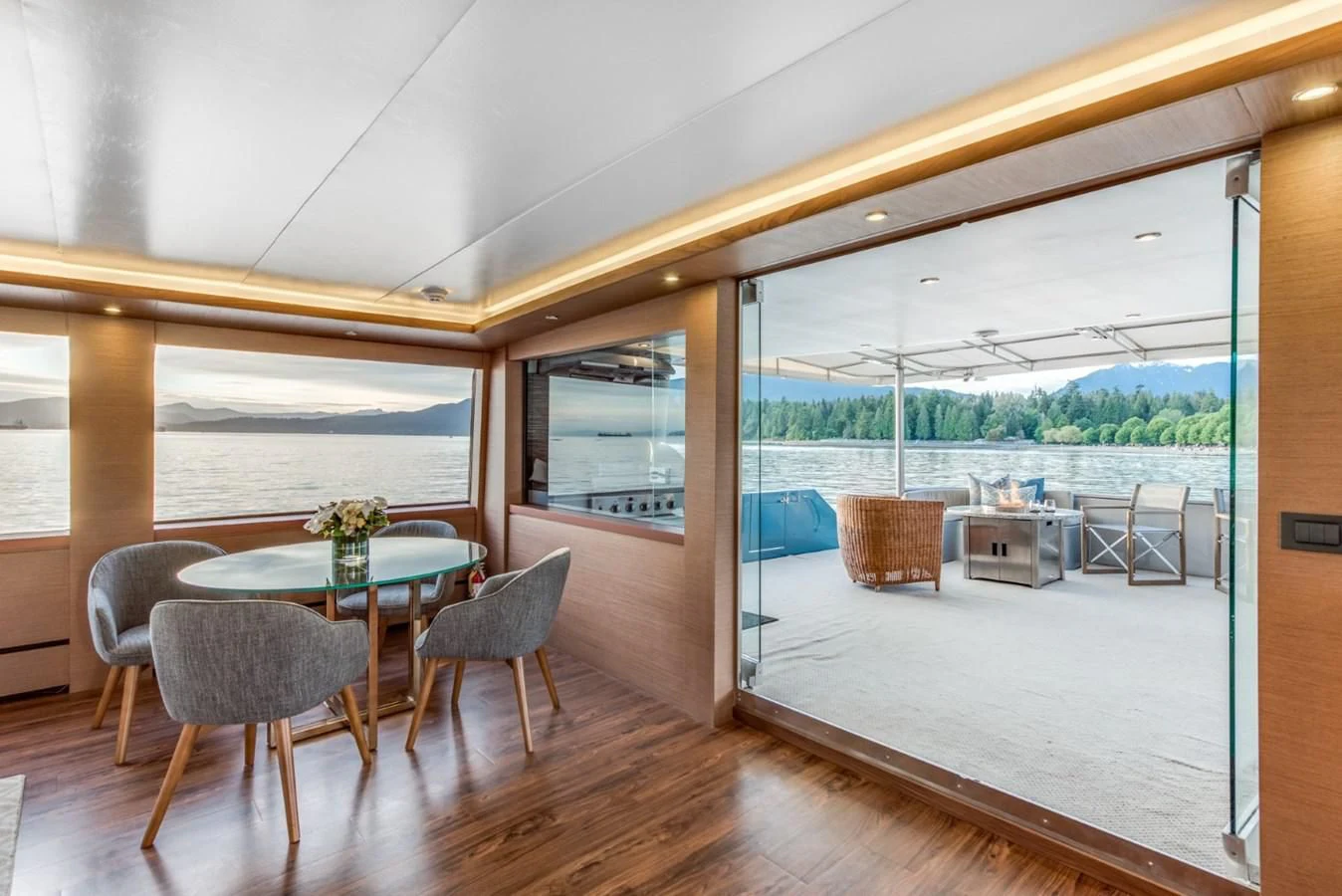 a room with a table and chairs aboard ASCENTE Yacht for Charter