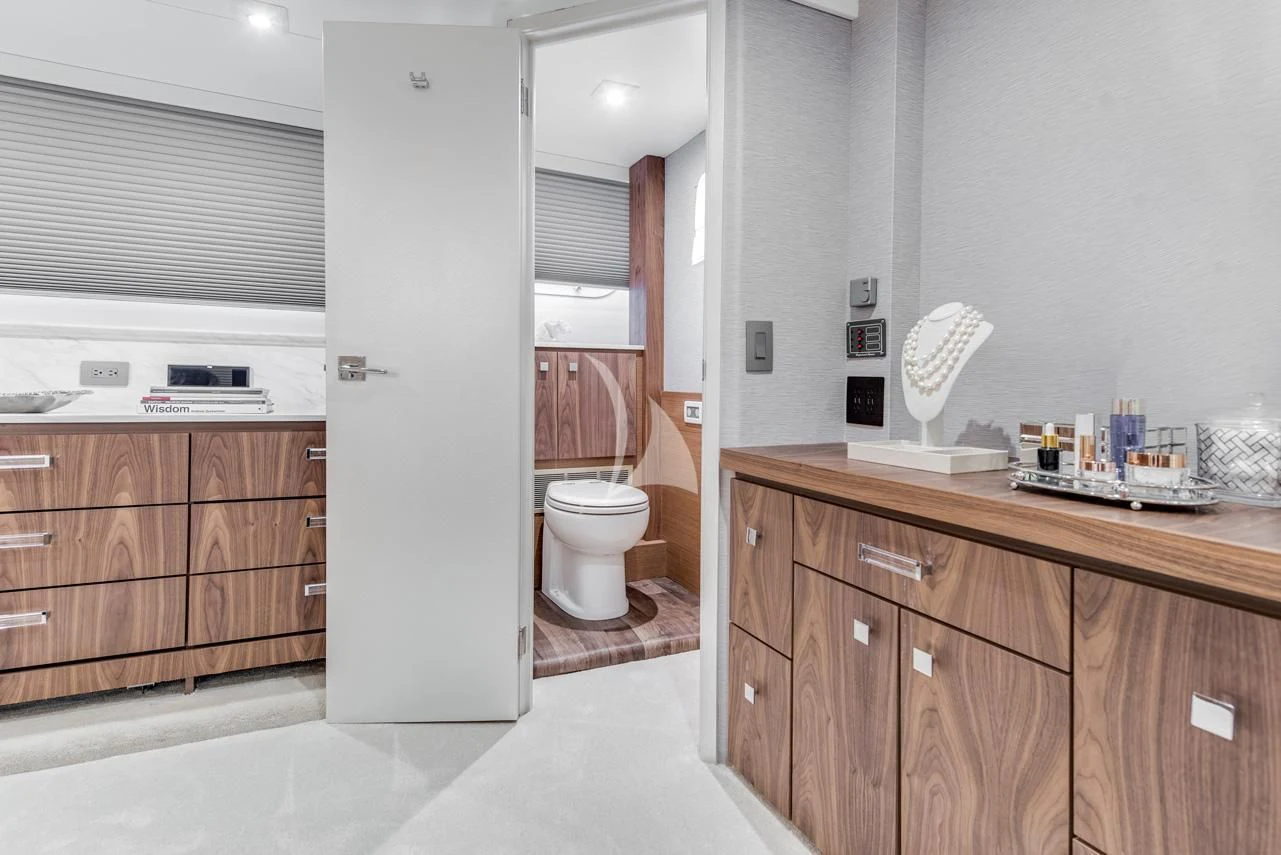 a bathroom with a toilet and a sink aboard ASCENTE Yacht for Charter