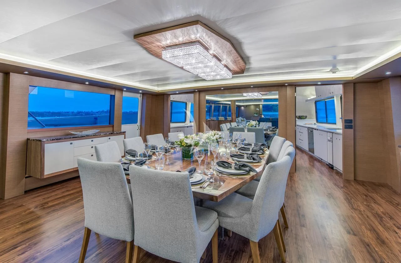 a dining room with a large table aboard ASCENTE Yacht for Charter