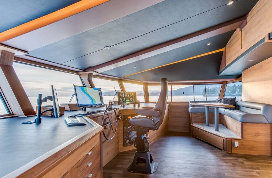 a room with a desk and a computer aboard ASCENTE Yacht for Charter