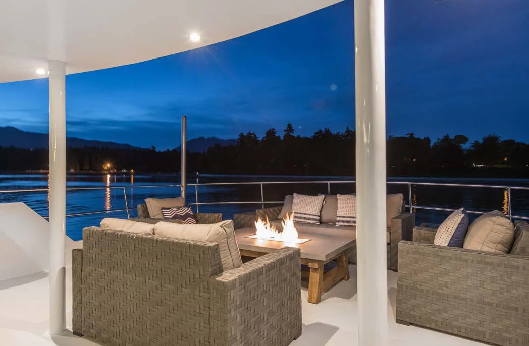 a patio with a couch and a pool aboard ASCENTE Yacht for Charter