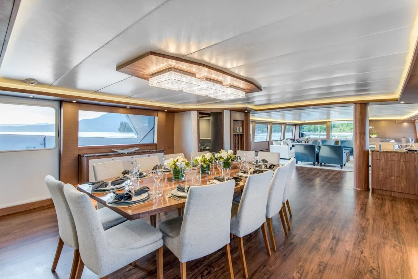 a large dining room with a large table and chairs aboard ASCENTE Yacht for Charter