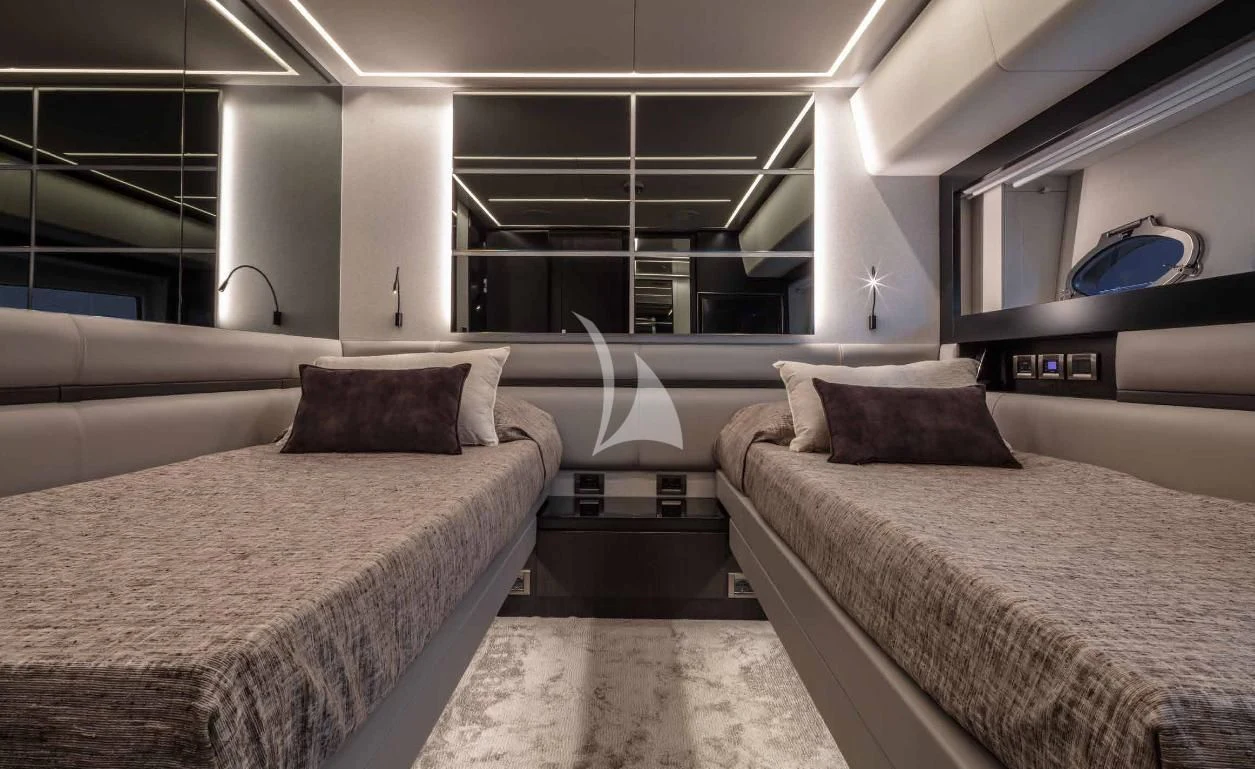 a room with two beds aboard JUST 4 Yacht for Sale