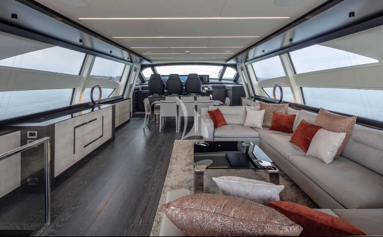 a train with a couch and a table aboard JUST 4 Yacht for Sale