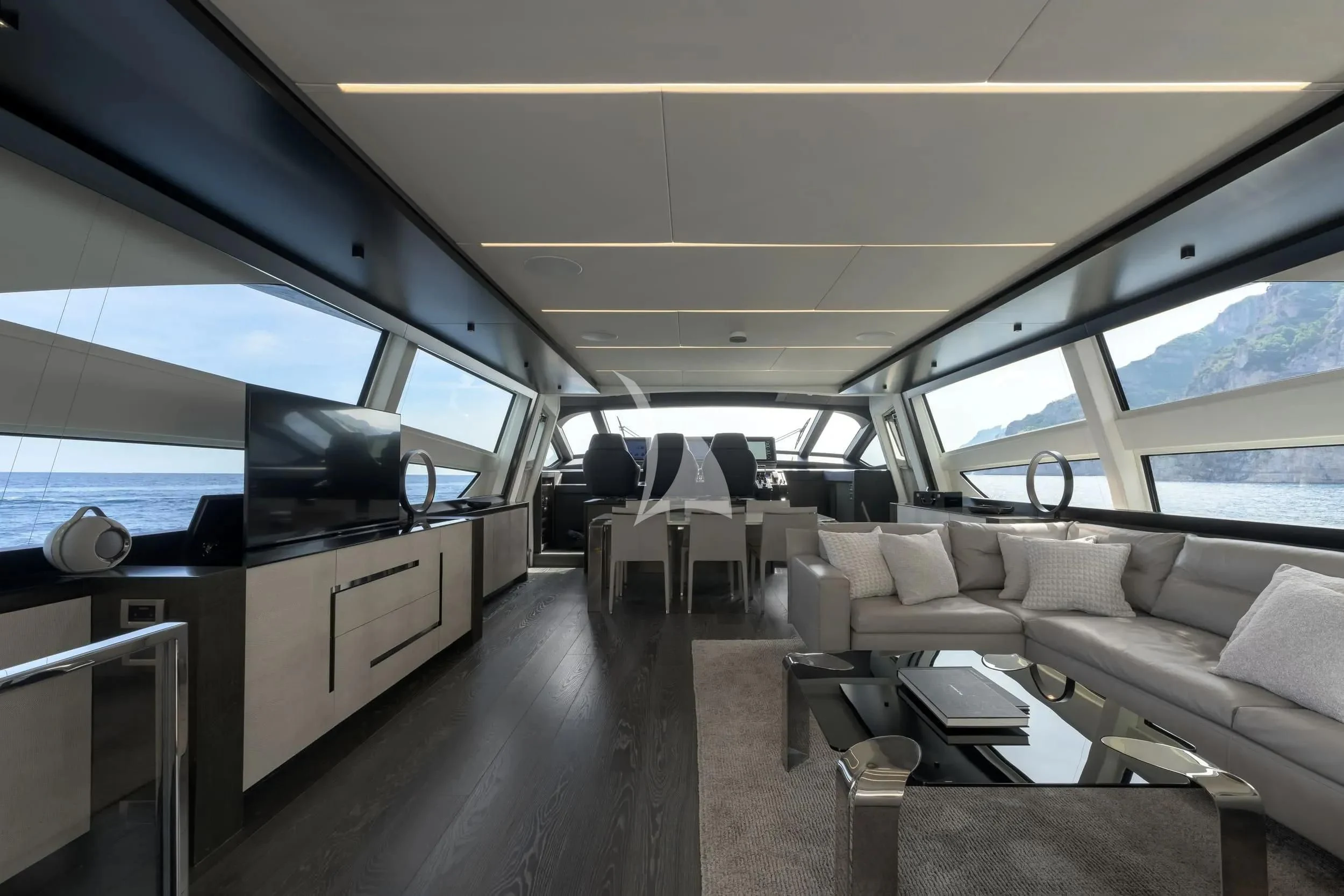 inside of a vehicle with a table and chairs and a window aboard JUST 4 Yacht for Sale