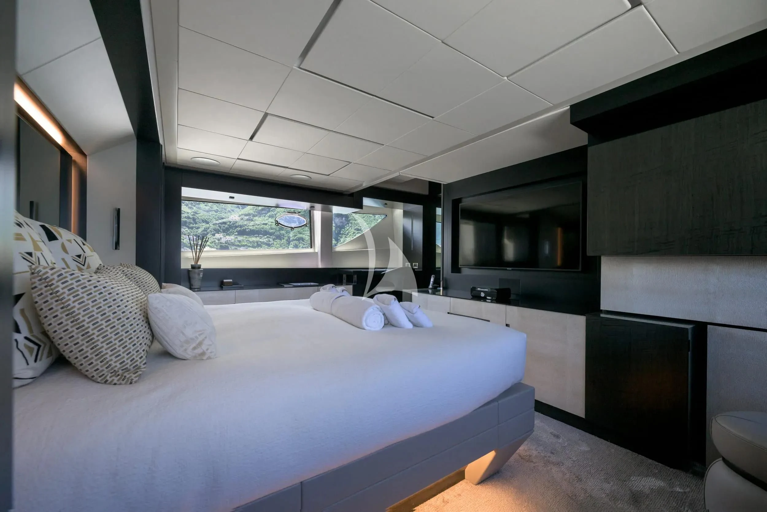a bedroom with a large bed aboard JUST 4 Yacht for Sale
