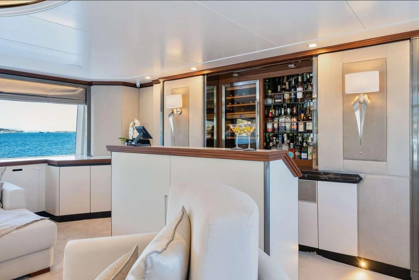 a room with a desk and a window aboard TITIAN PEARL Yacht for Sale