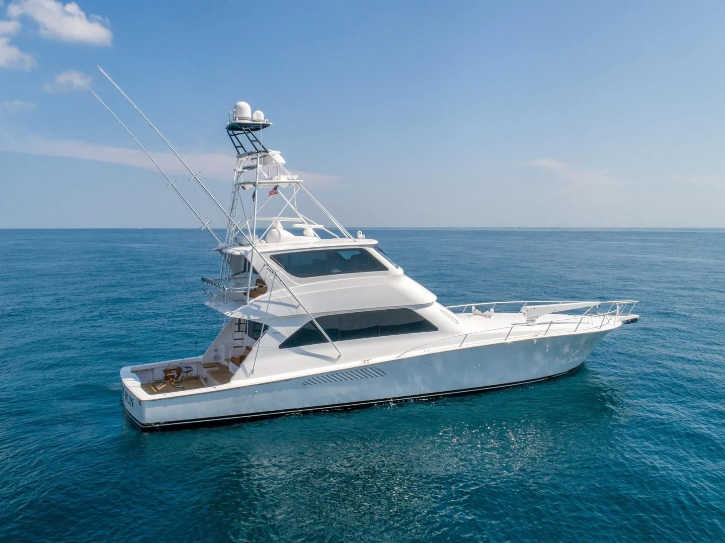 a white yacht in the water aboard HOME RUN Yacht for Sale