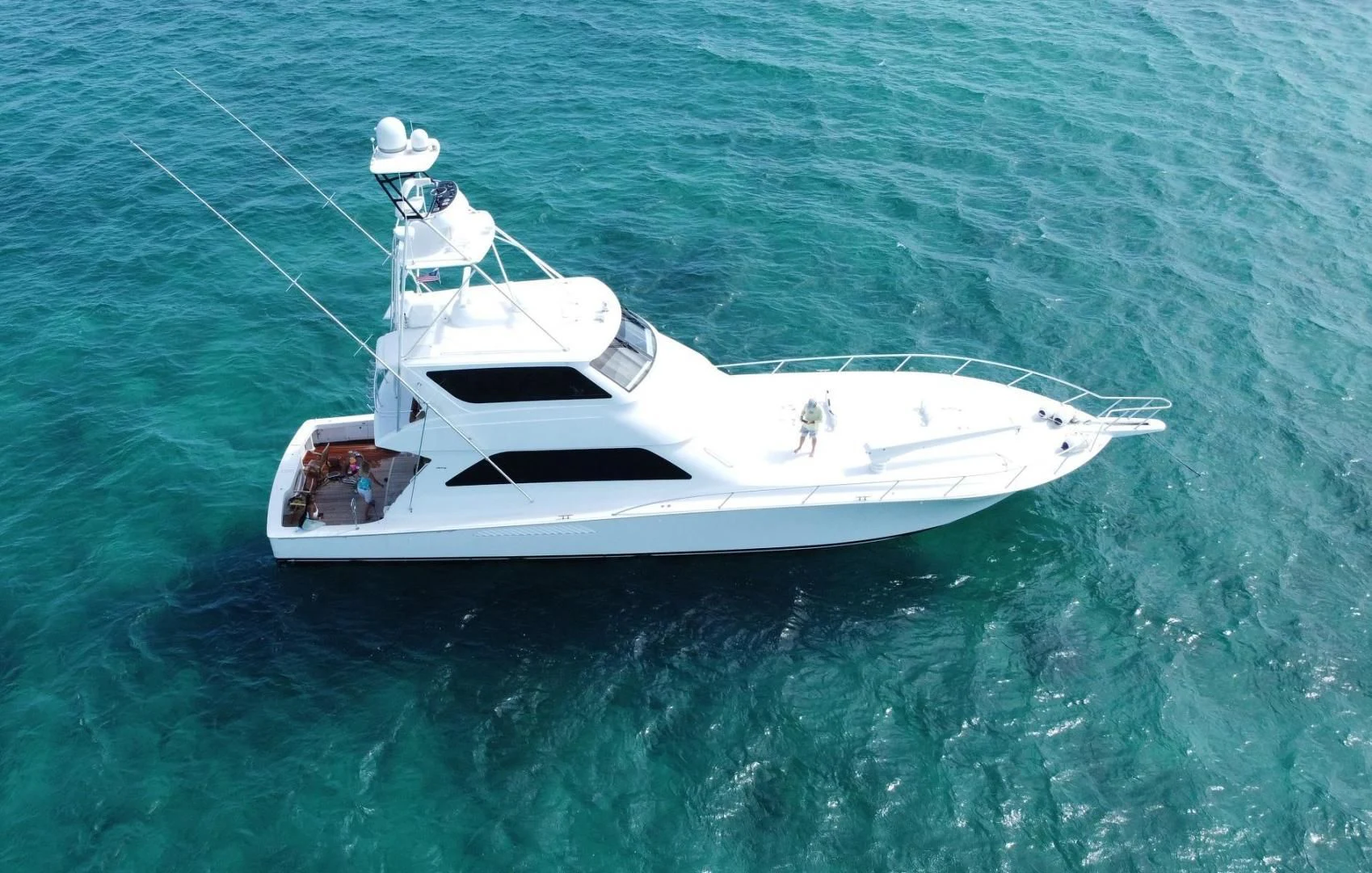 a white boat in the water aboard HOME RUN Yacht for Sale