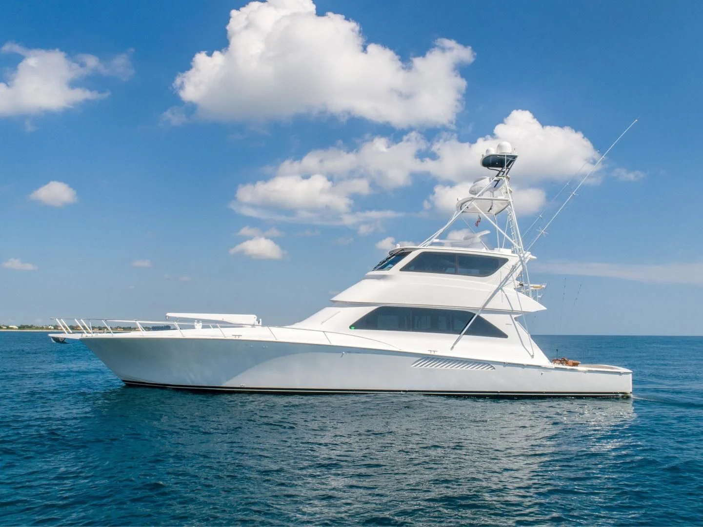a white yacht in the water aboard HOME RUN Yacht for Sale