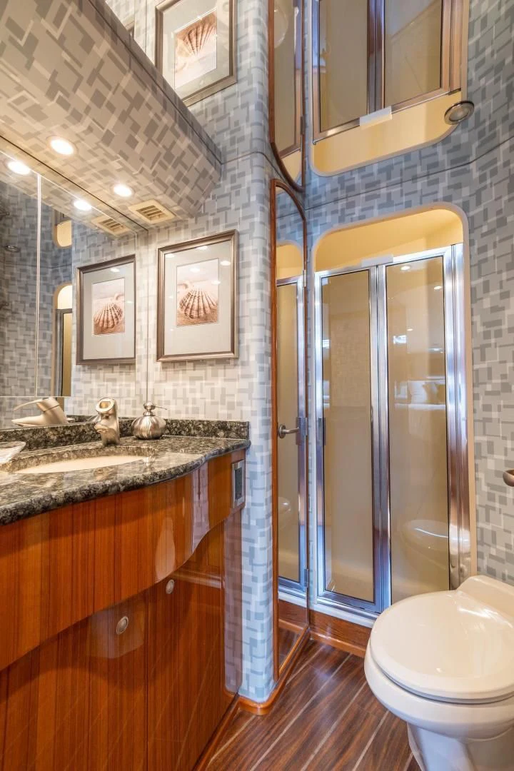 a bathroom with a glass shower aboard HOME RUN Yacht for Sale