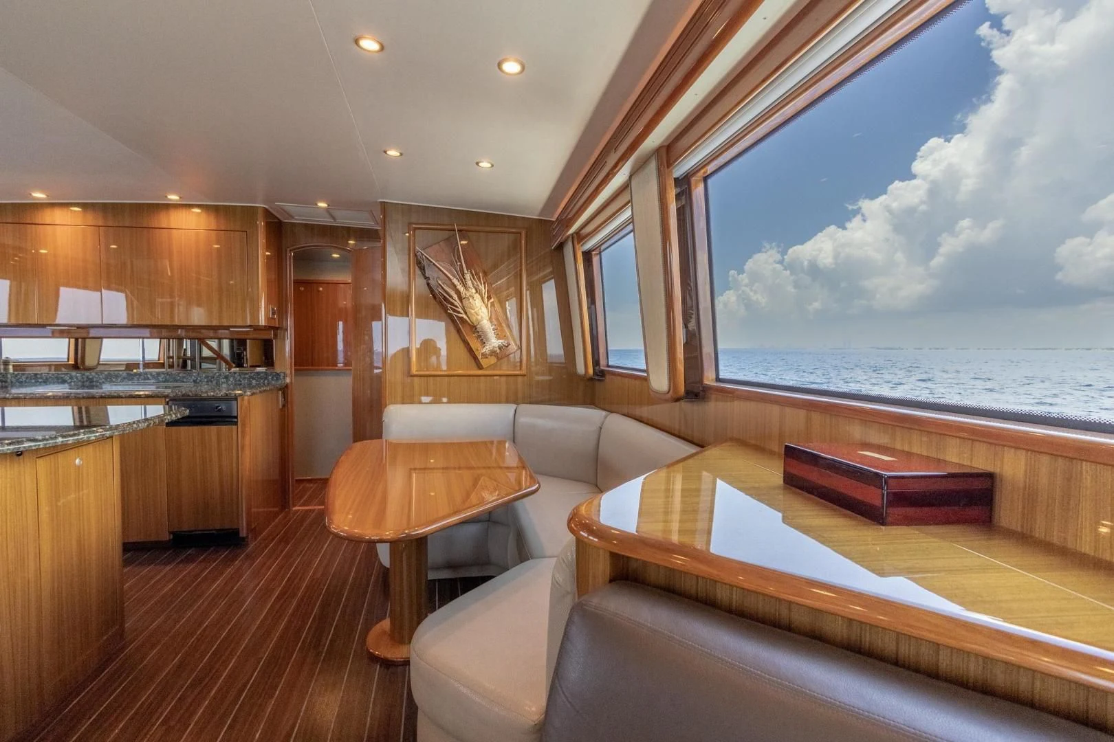 a living room with a large window aboard HOME RUN Yacht for Sale
