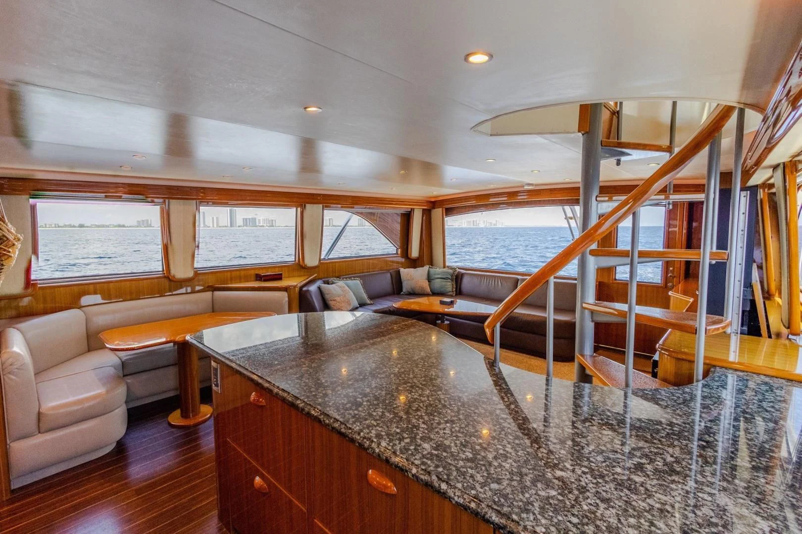 a kitchen with a large window aboard HOME RUN Yacht for Sale