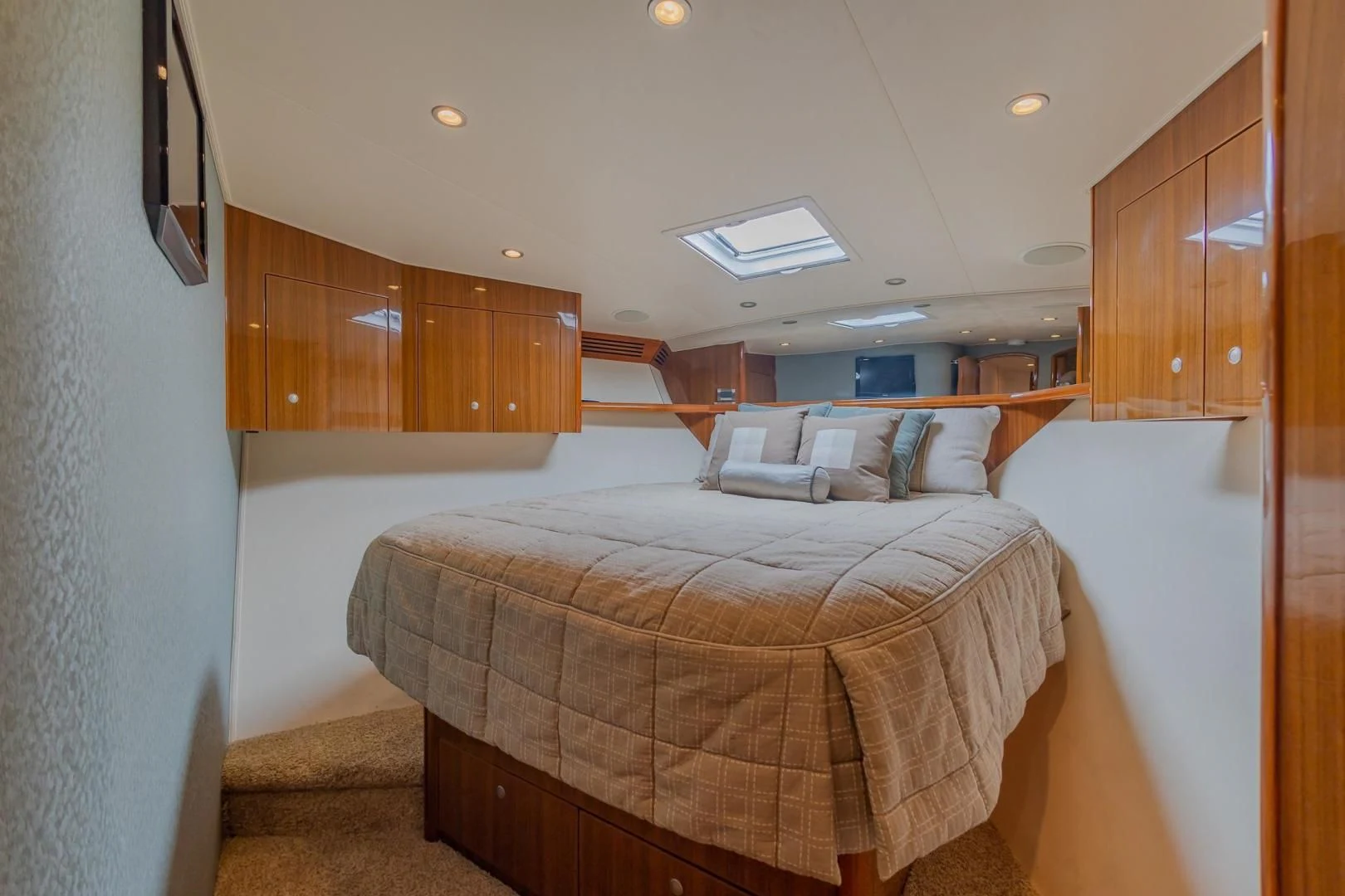 a bedroom with a bed aboard HOME RUN Yacht for Sale