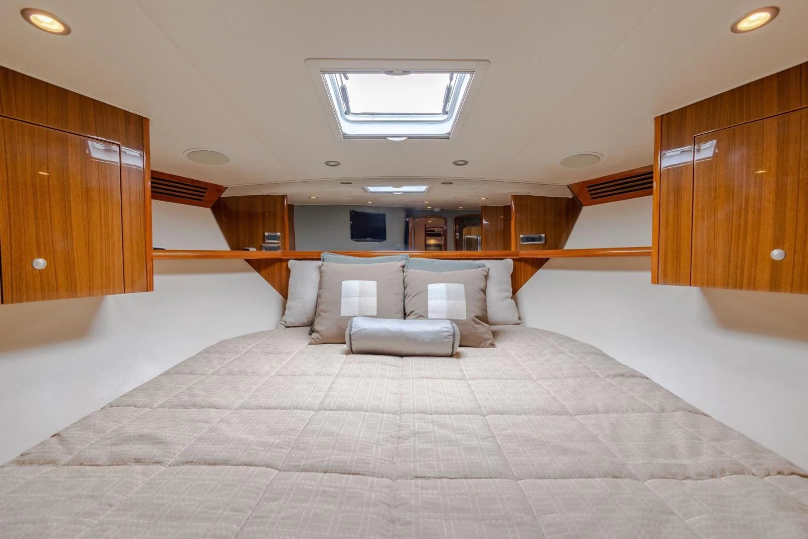 a room with a bed and a couch aboard HOME RUN Yacht for Sale