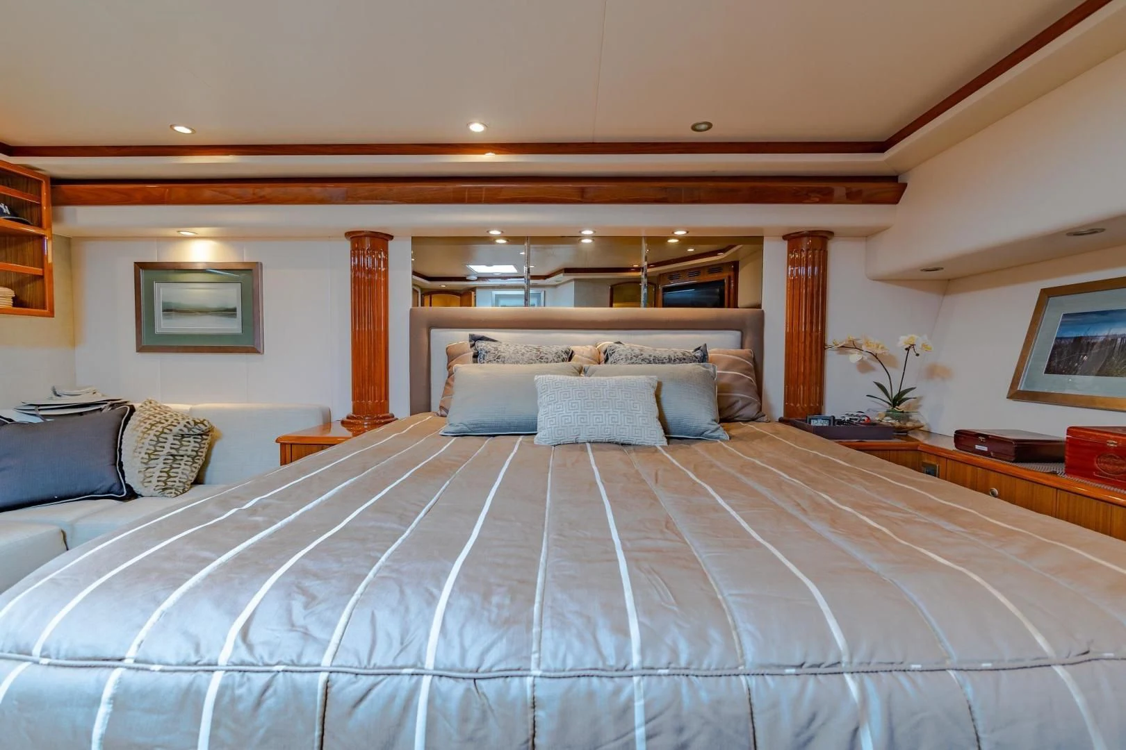 a large bed with white sheets aboard HOME RUN Yacht for Sale