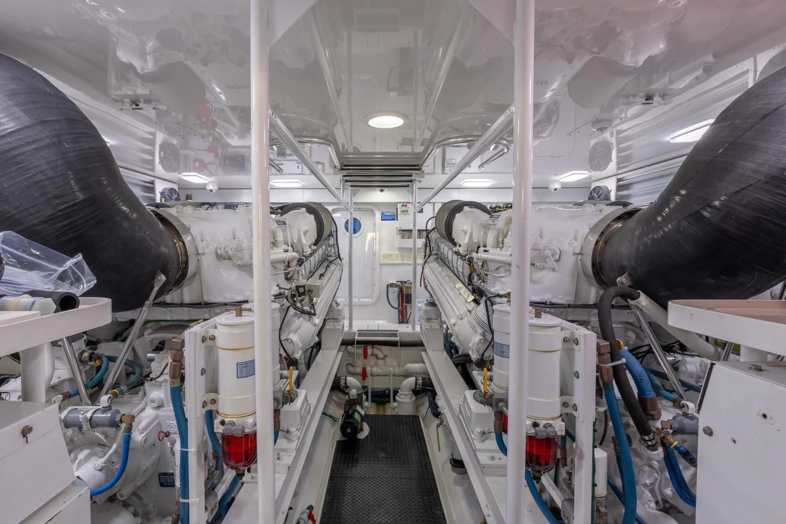 a room with white pipes aboard HOME RUN Yacht for Sale
