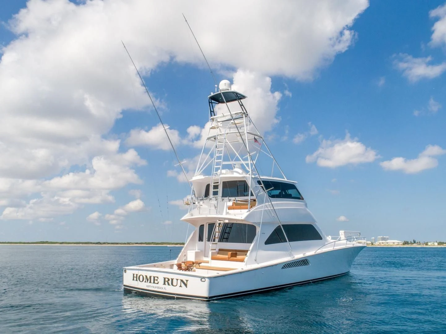 a white boat in the water aboard HOME RUN Yacht for Sale
