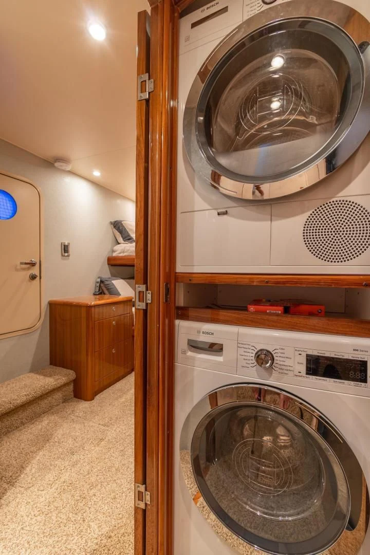 a washing machine in a room aboard HOME RUN Yacht for Sale