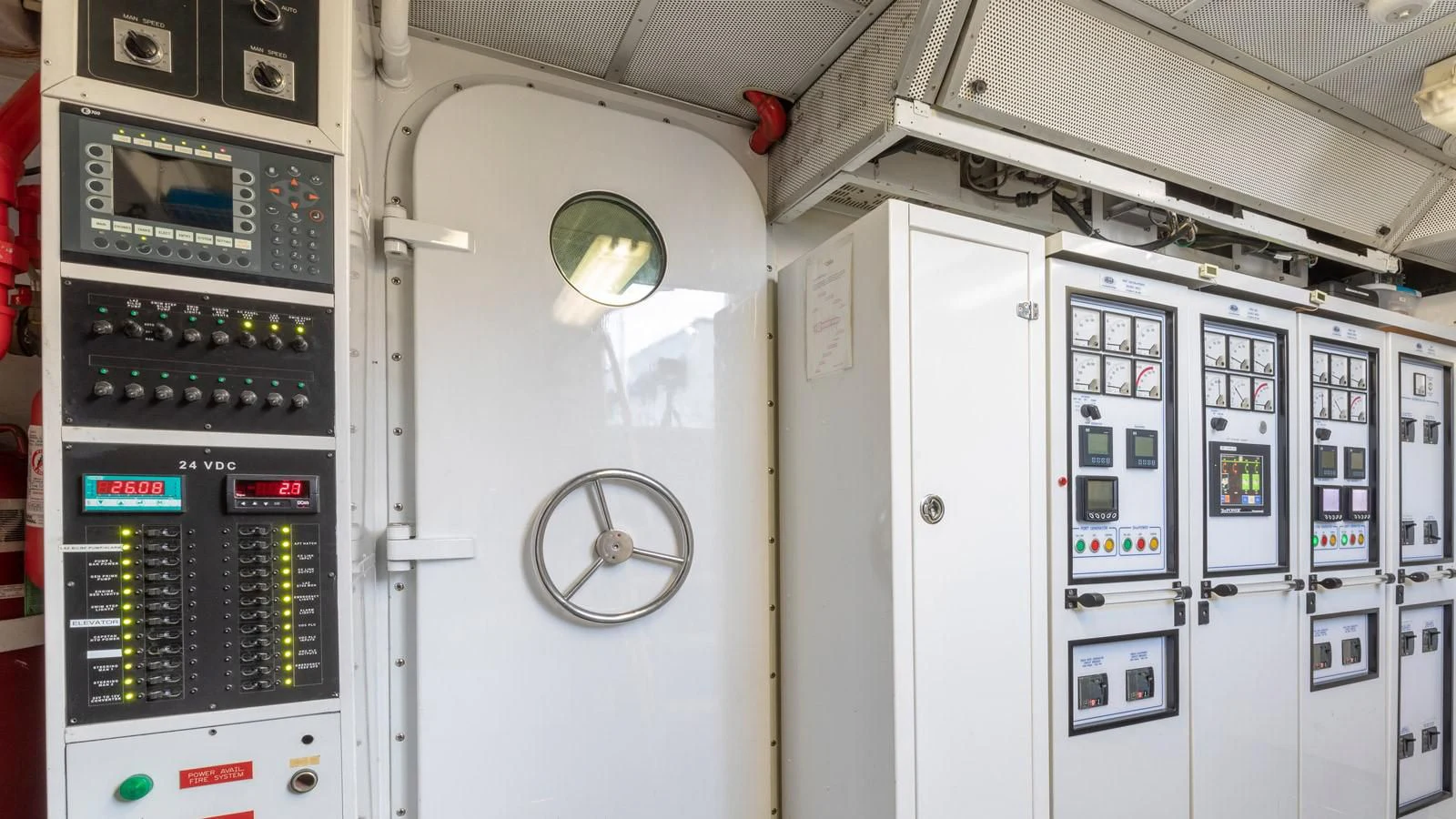 a row of computer machines aboard POPEYE Yacht for Sale