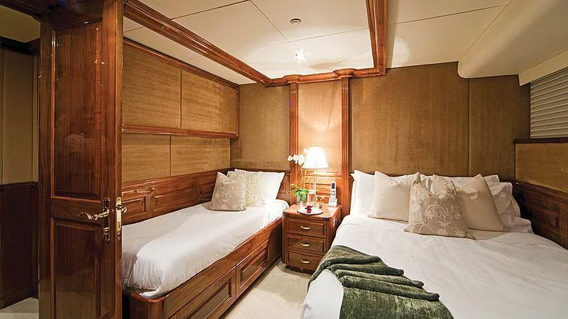a room with two beds aboard POPEYE Yacht for Sale