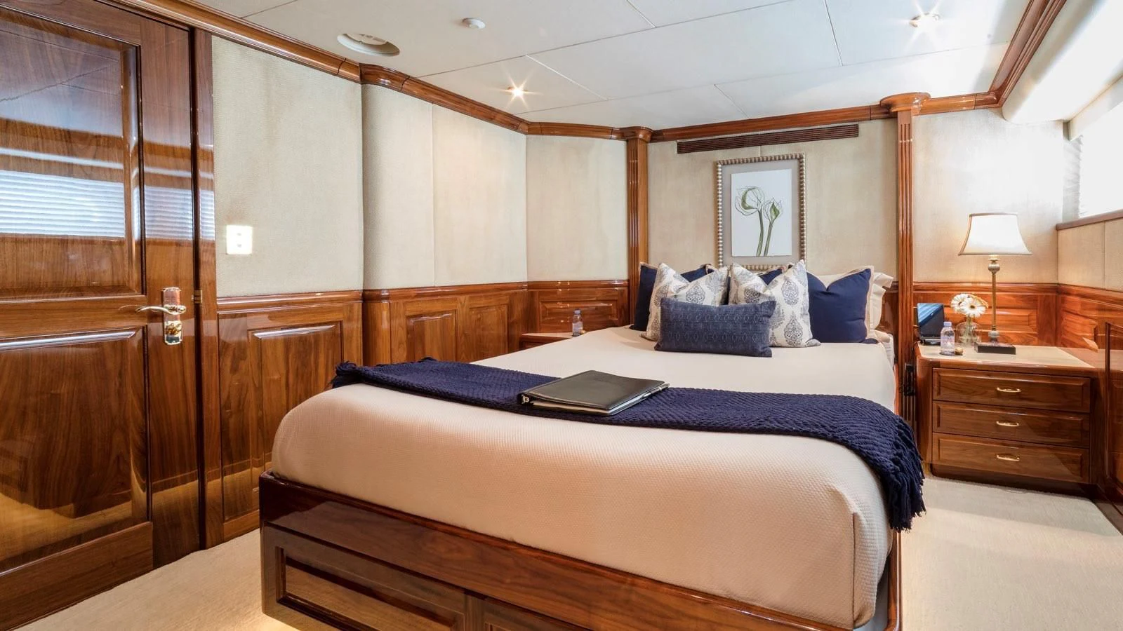 a bed in a room aboard POPEYE Yacht for Sale