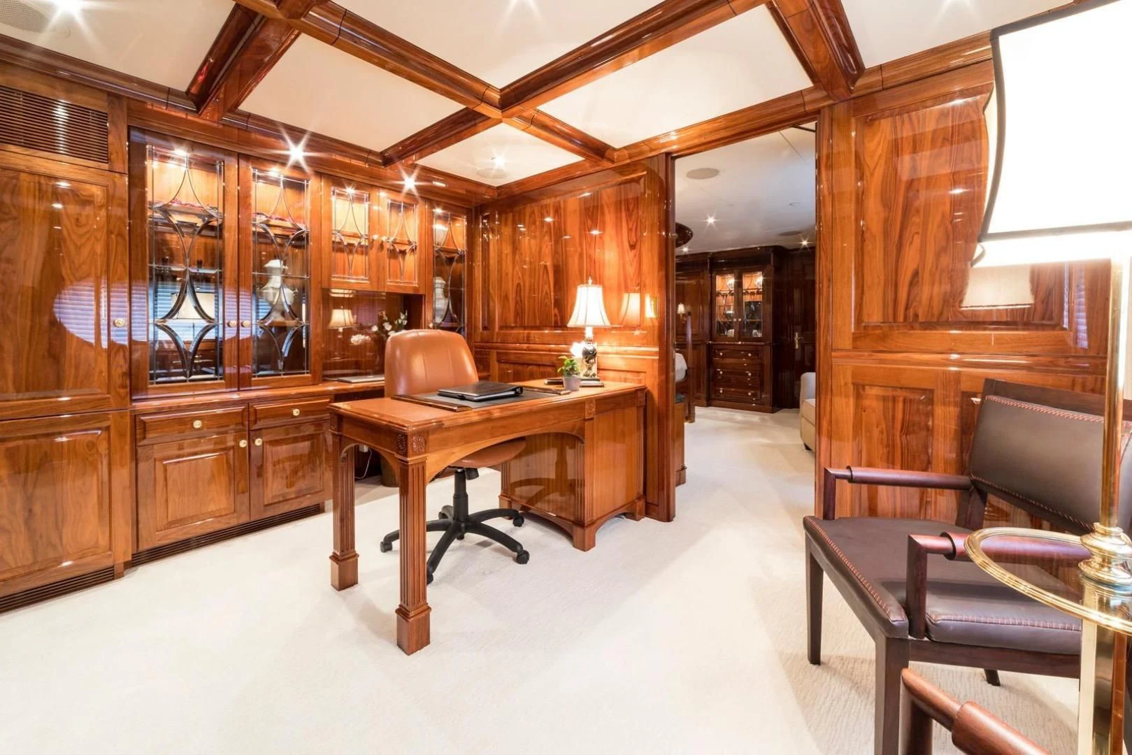 a room with a desk and chairs aboard POPEYE Yacht for Sale