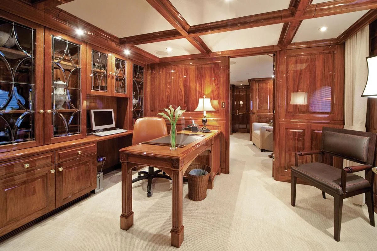 a room with a desk and a chair aboard POPEYE Yacht for Sale