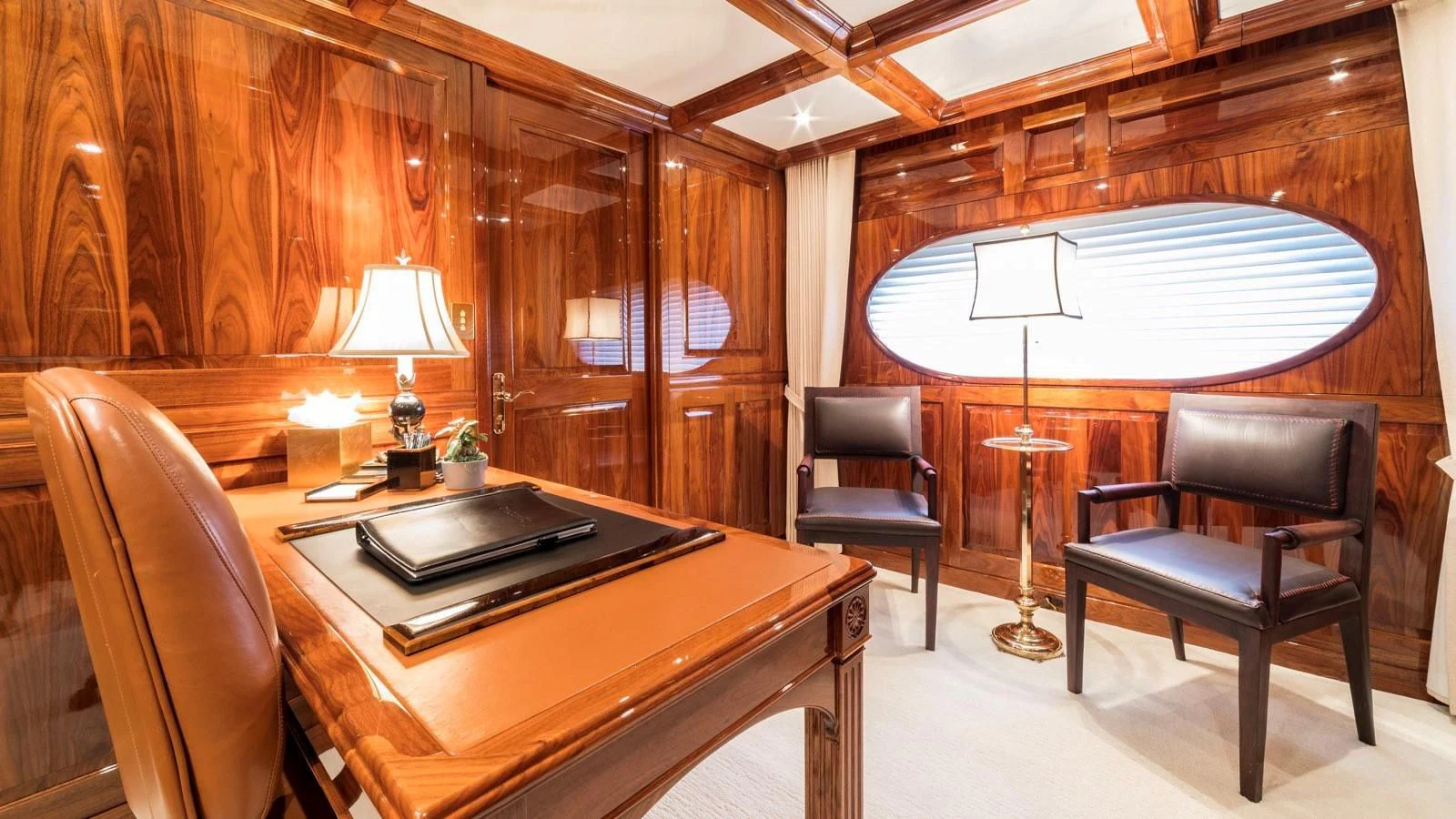 a room with a piano and a piano aboard POPEYE Yacht for Sale