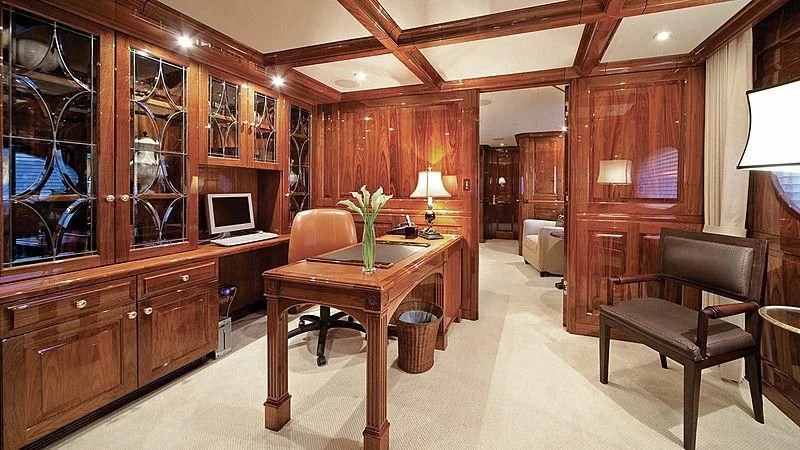 a room with a desk and a chair aboard POPEYE Yacht for Sale