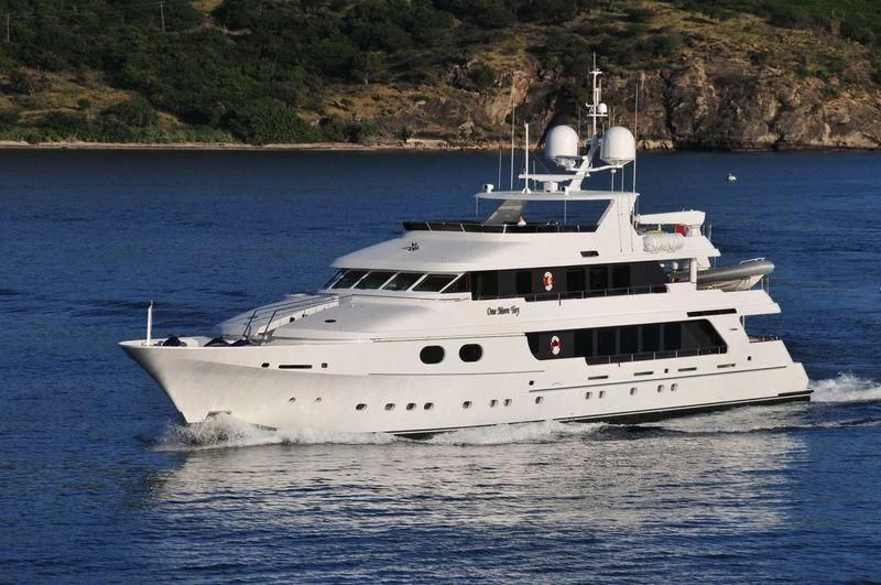 a white yacht on the water aboard POPEYE Yacht for Sale