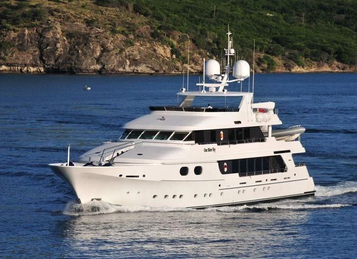 a white yacht on the water aboard POPEYE Yacht for Sale