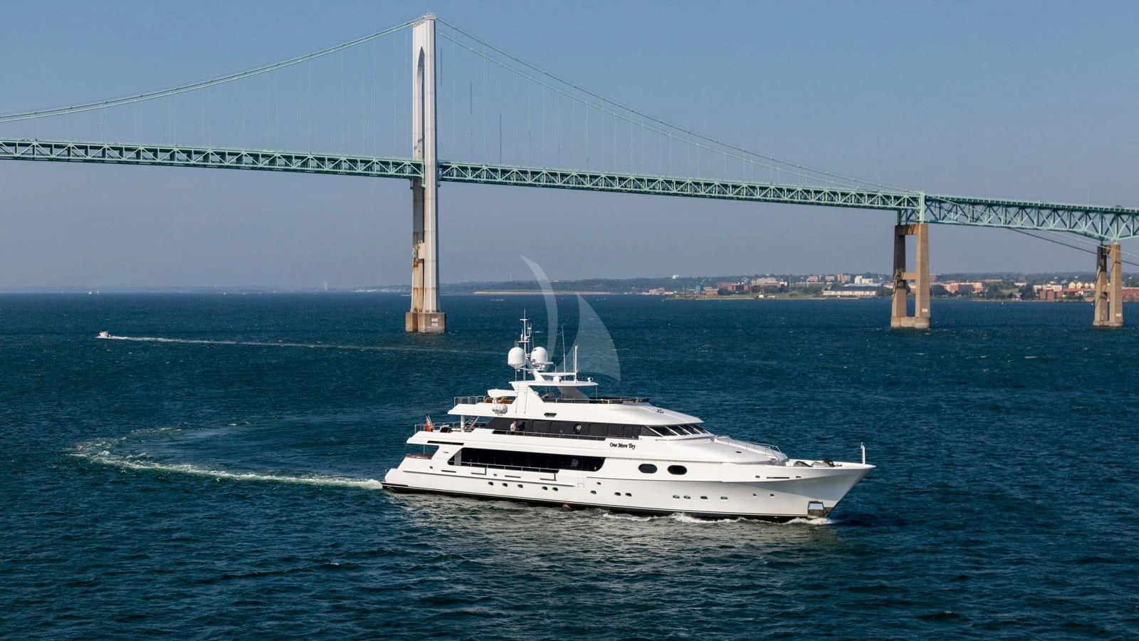 a boat sailing under a bridge aboard POPEYE Yacht for Sale