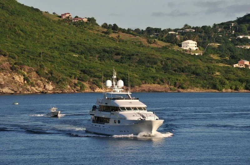 a white boat on the water aboard POPEYE Yacht for Sale