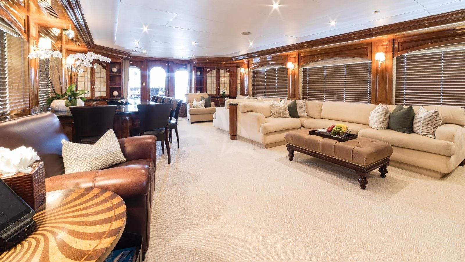 a living room with a couch and a table aboard POPEYE Yacht for Sale