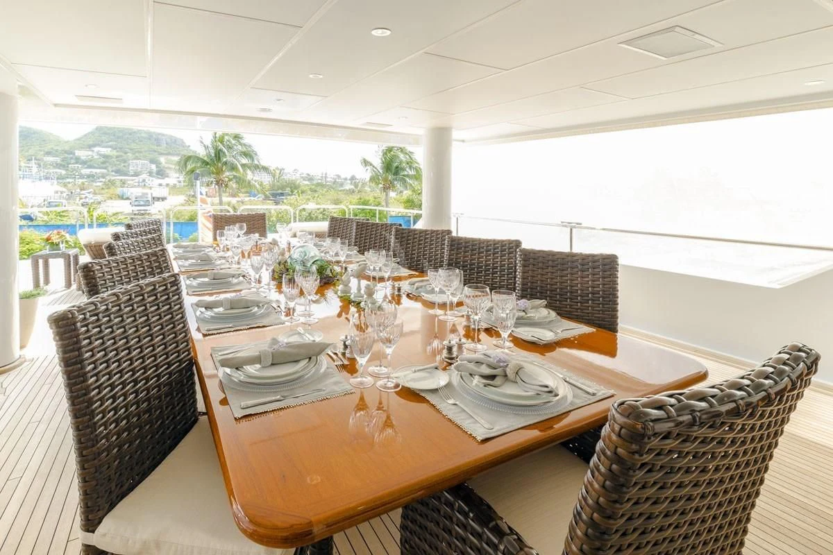 a table set for a meal aboard POPEYE Yacht for Sale